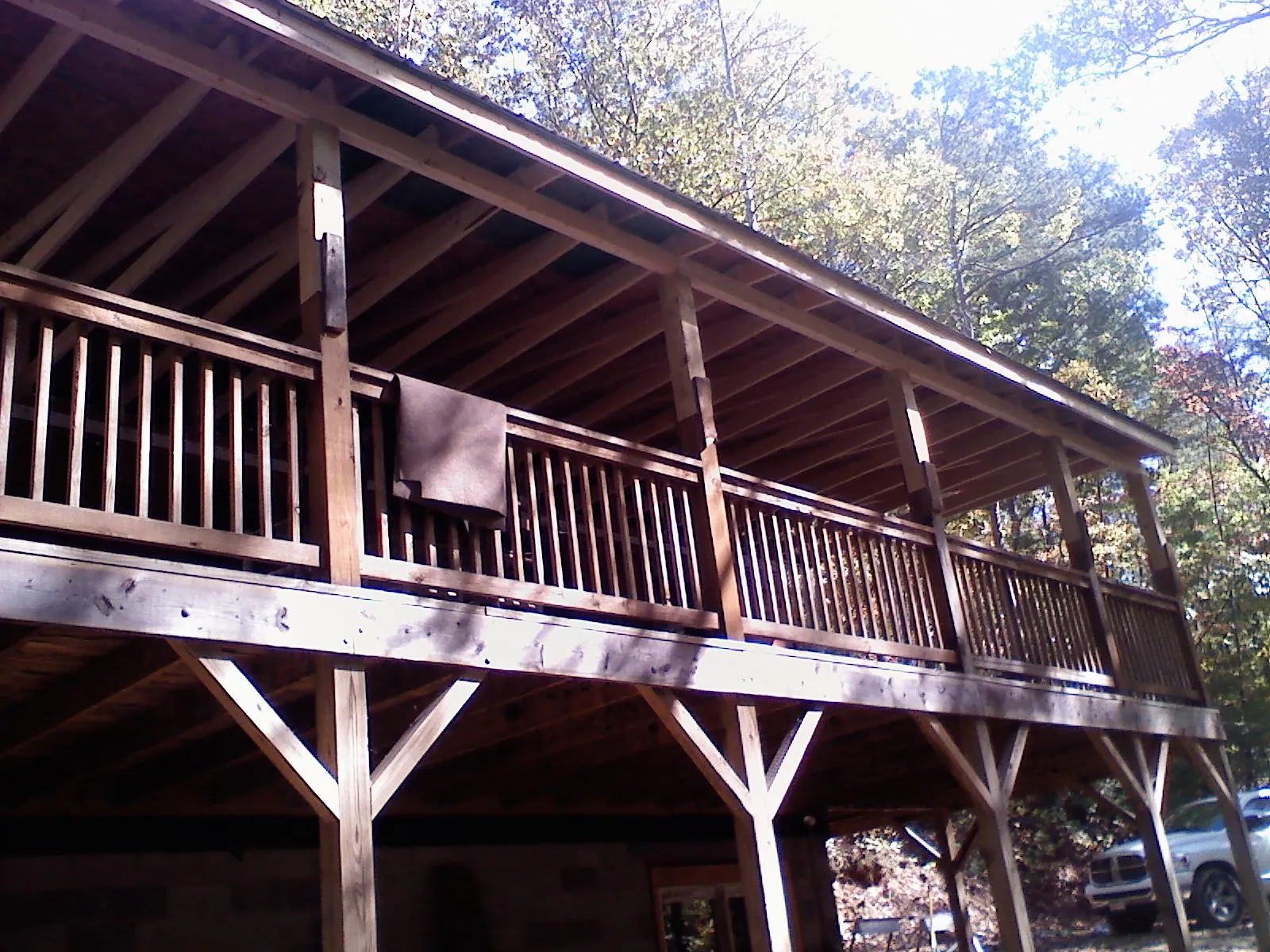Timber framing under a new elevated porch and deck — Roof Leak Repair in Lucerne Valley by Roofing Brothers